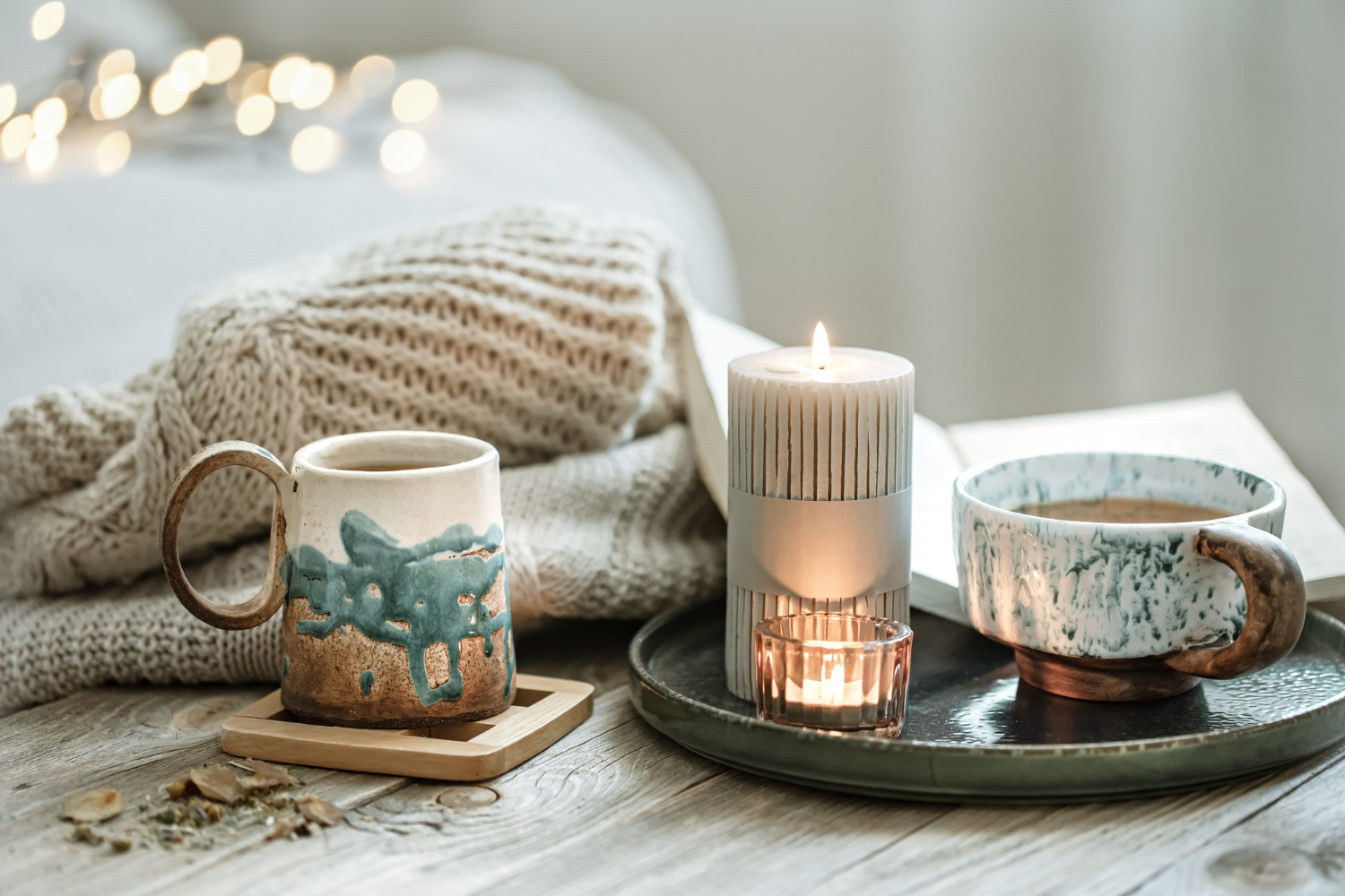 cozy-composition-with-ceramic-cups-candles